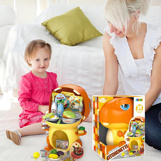 Child playing with a toy kitchen set on a couch next to an adult, with the toy's packaging visible.