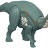 Dinosaur toy figure on a plain background