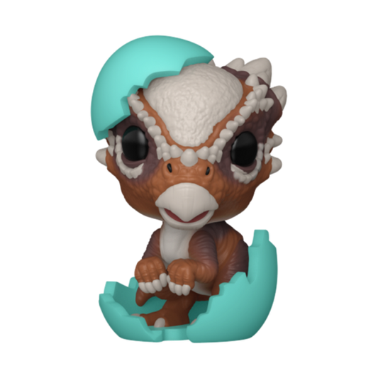 Toy figure of a creature with a teal shell on a white background
