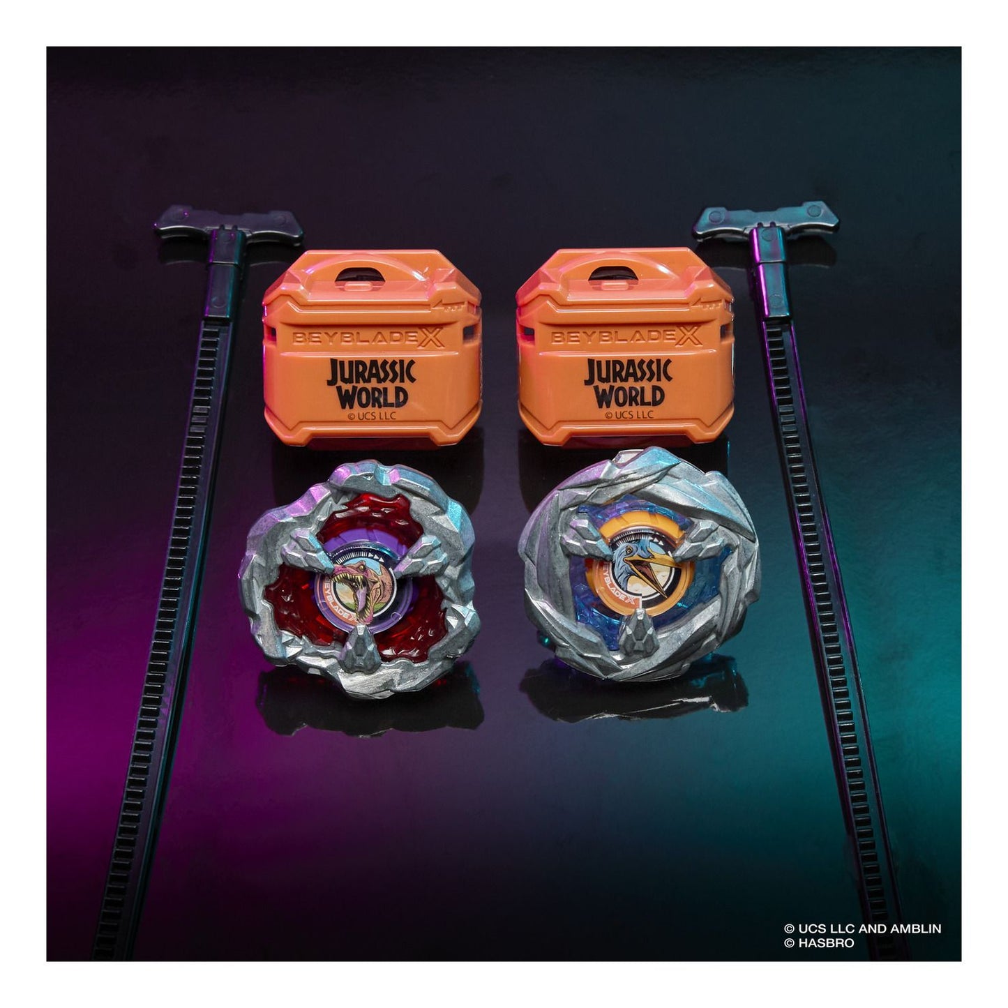 Jurassic World toy set with two orange containers, two metallic toys, and two hammers on a gradient background.