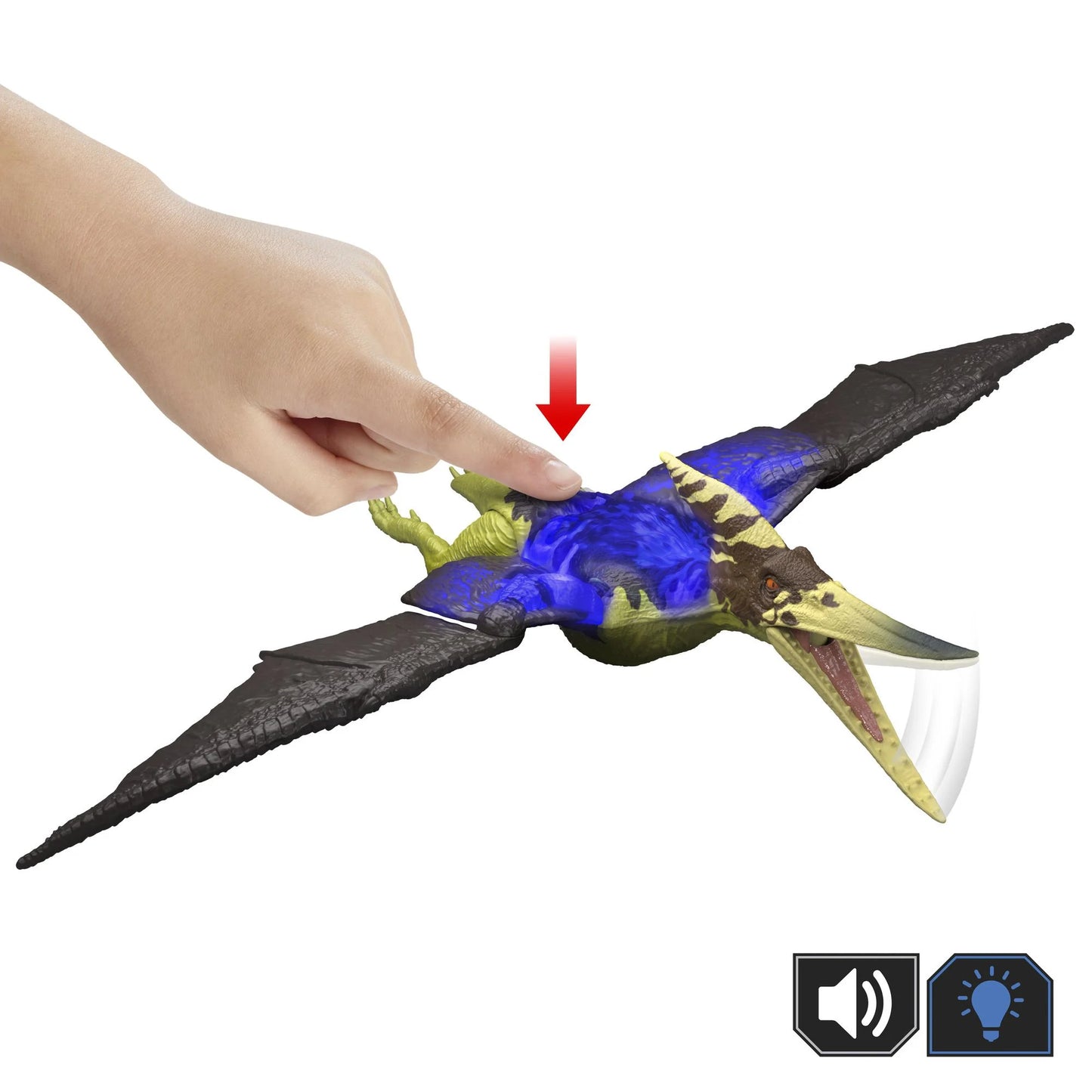 Toy pterodactyl with a hand pressing a button, indicating sound and light features.