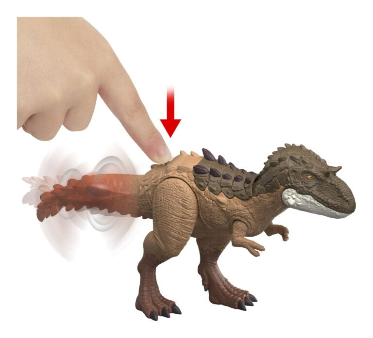 Toy dinosaur with a hand pressing a button on a white background