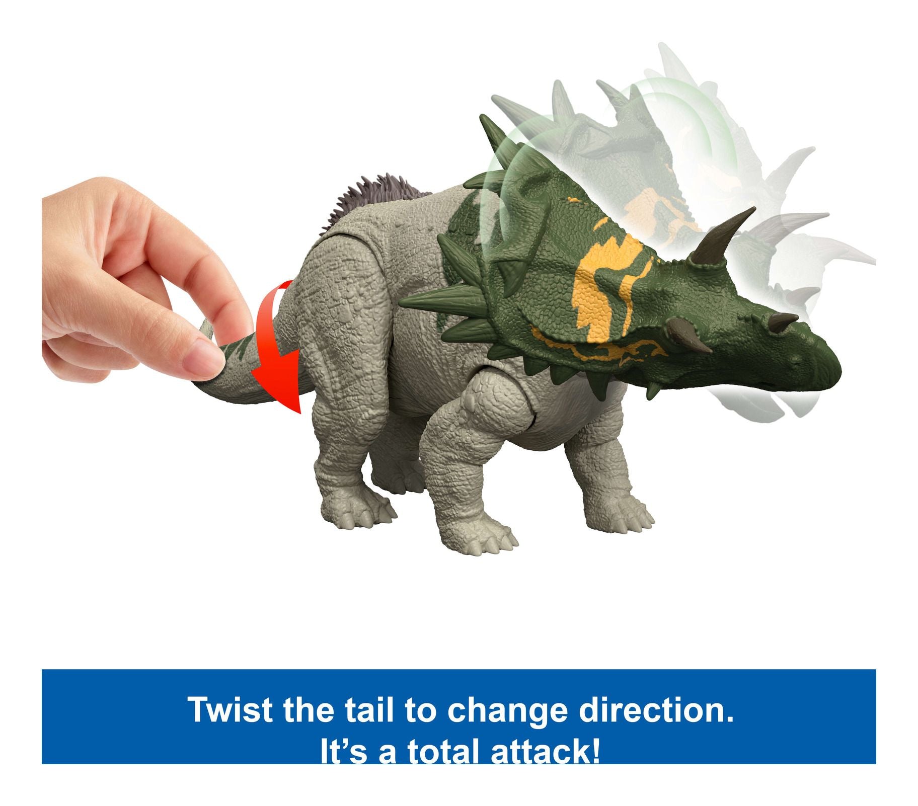 Toy triceratops with a hand twisting its tail, on a white background.