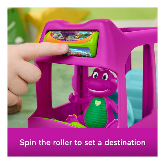 Purple toy with a character inside, featuring text 'Spin the roller to set a destination'.