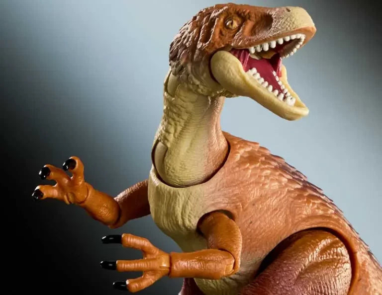 Toy dinosaur figure with an open mouth on a gradient background