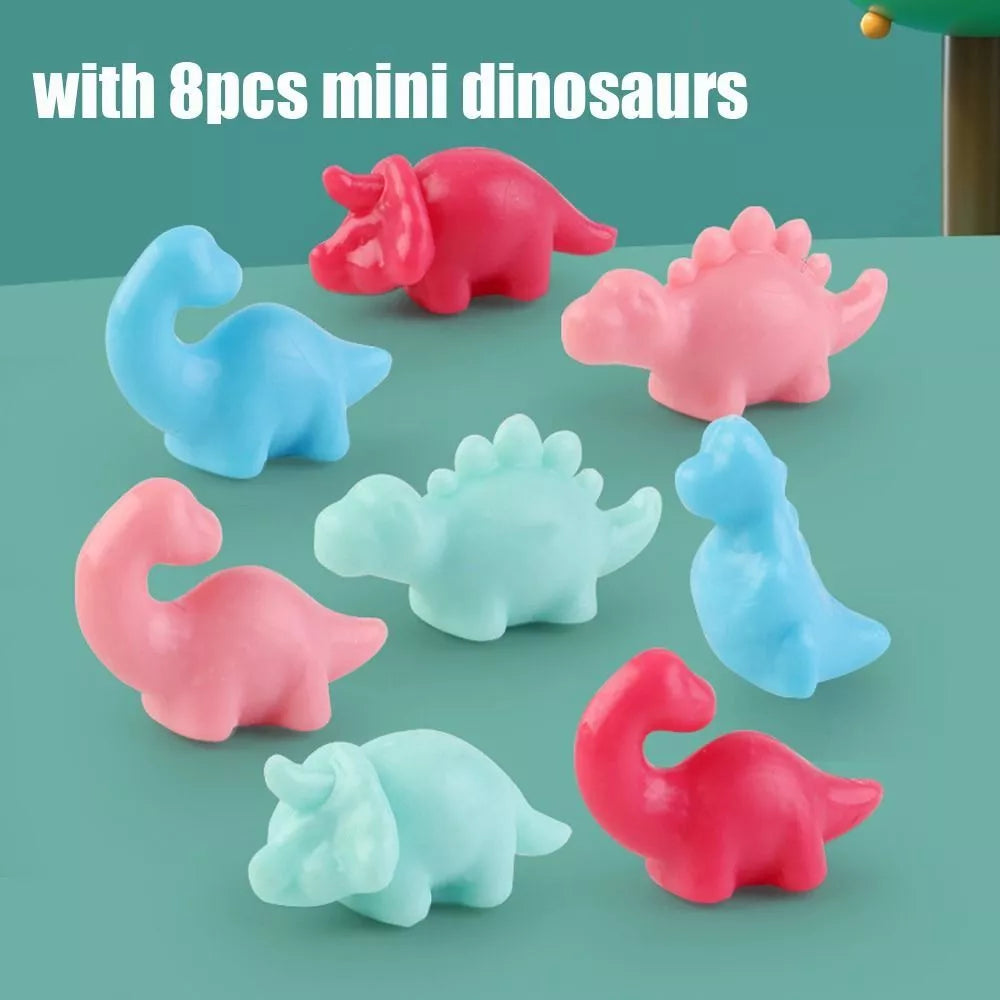 mini dino claw machine on a white background