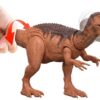 Toy dinosaur figure with a red bandana on a plain background